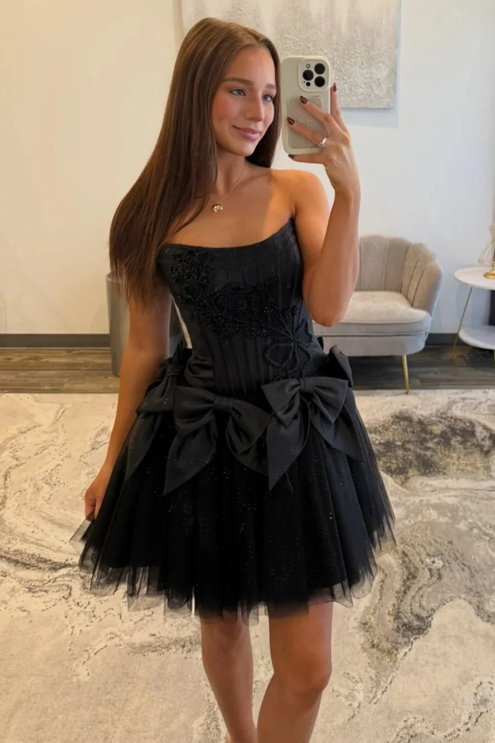 Black Strapless Corset Homecoming Dress with Tulle Skirt and Statement Bows - Image 2