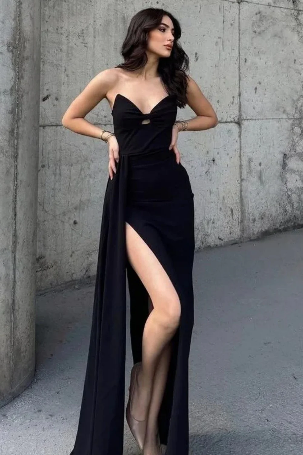 Dramatic Black Cutout Dress with Thigh-High Slit and Draped Detail
