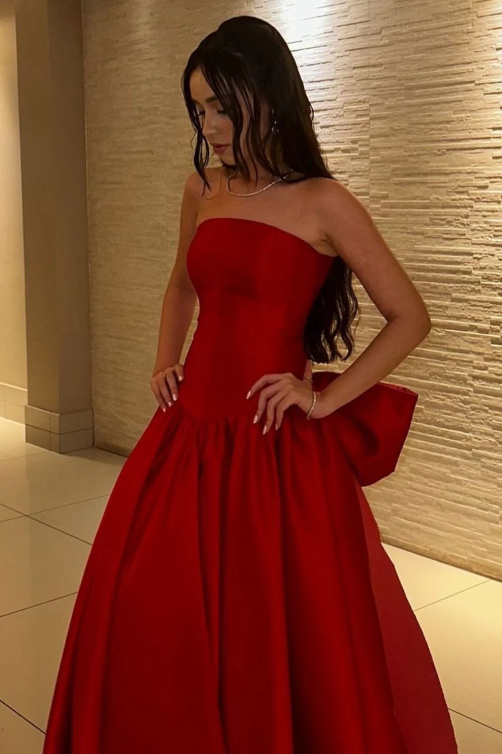 Elegant Red Strapless Ball Gown Prom Dress with Statement Bow Back - Image 3