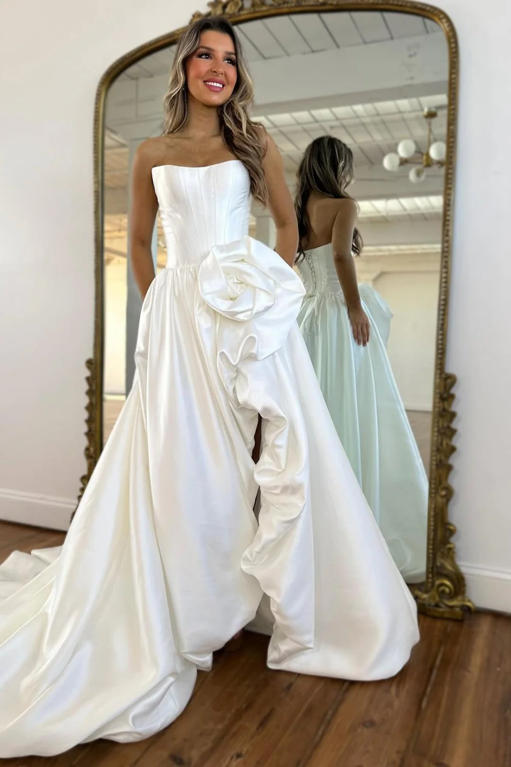 Luxury Strapless Corset Prom Gown with High Slit Skirt and Rosette Accent - Image 11