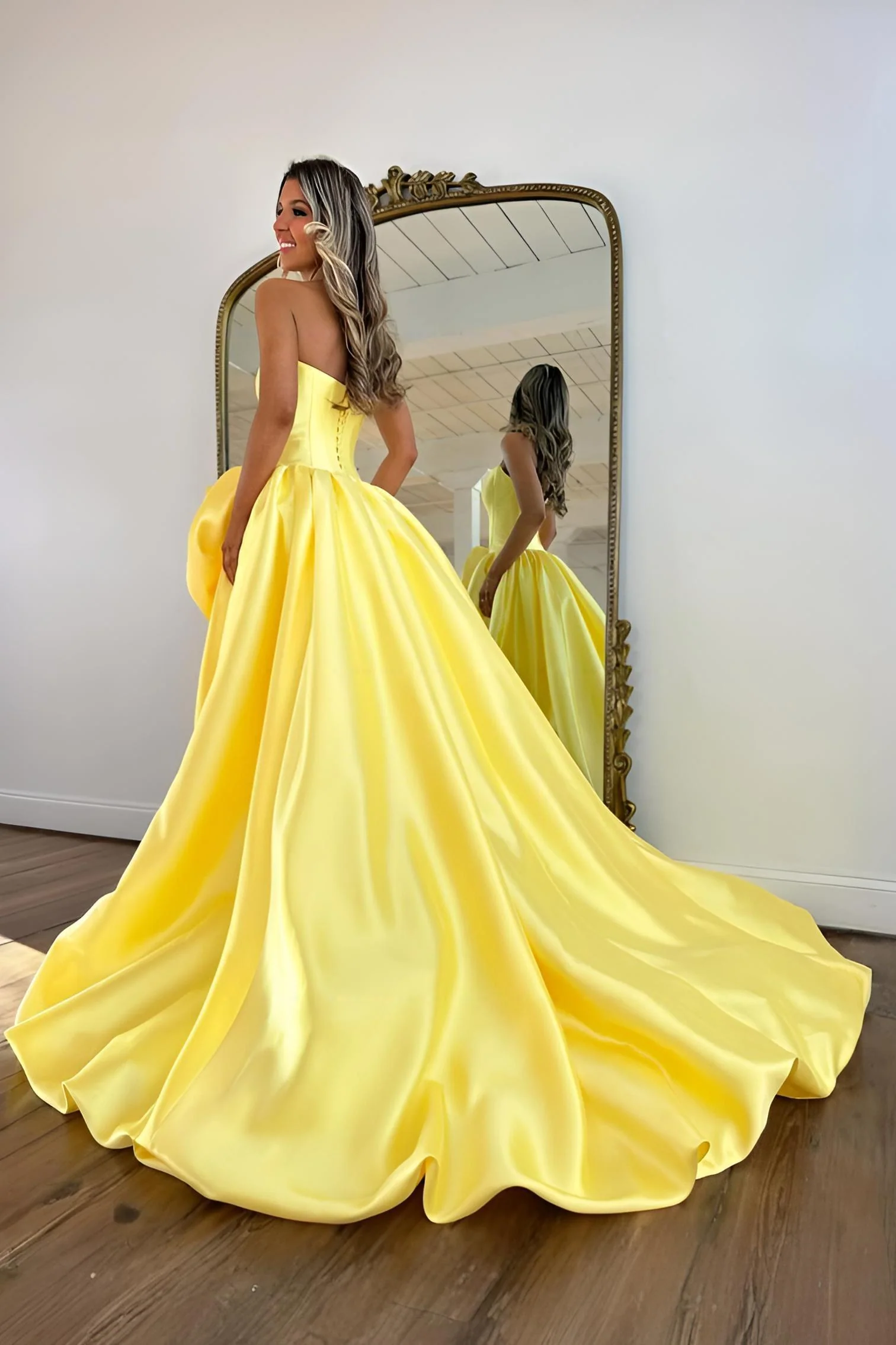 Luxury Strapless Corset Prom Gown with High Slit Skirt and Rosette Accent - Image 2
