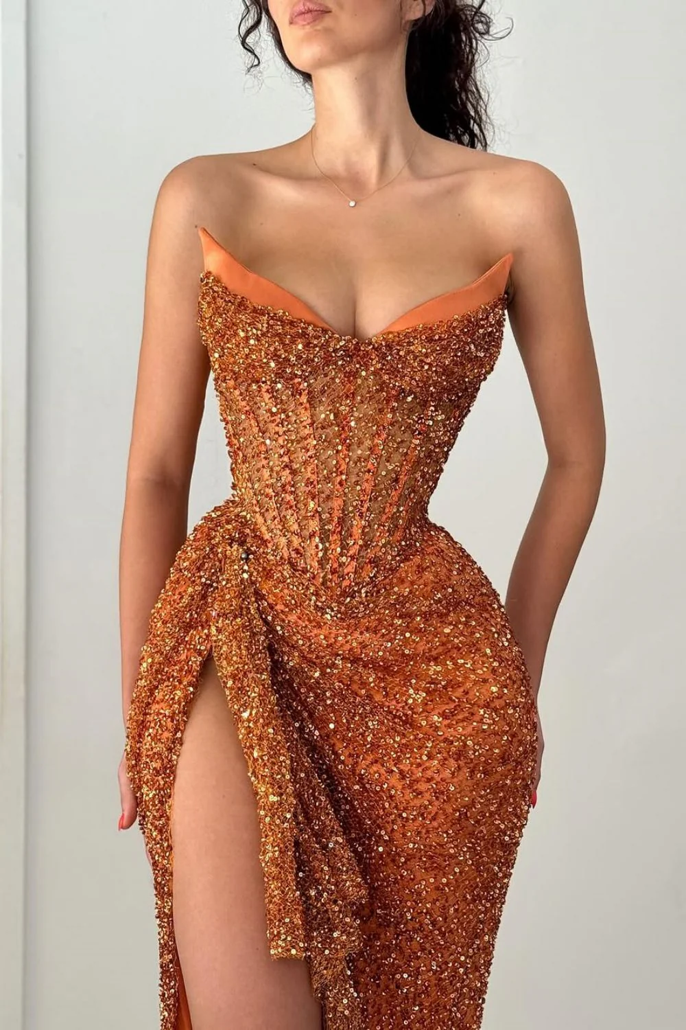 Sparkly Orange Strapless Sequin Prom Dress with Corset and Slit - Image 2